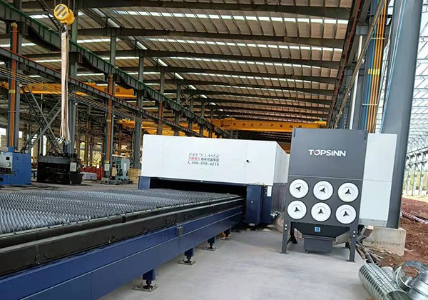 What are the ways to deal with the fumes generated by laser cutting machines?